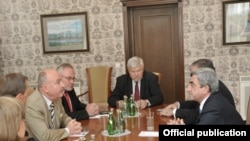 Armenia -- President Serzh Sarkisian (R) meets with the U.S., Russian and Frech co-chairs of the OSCE Minsk Group in Saint-Petersburg, 18June 2010.