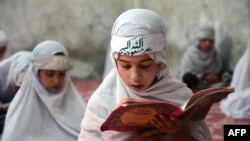 Afghan girls study the Koran at a madrasah in Kandahar. (file photo)