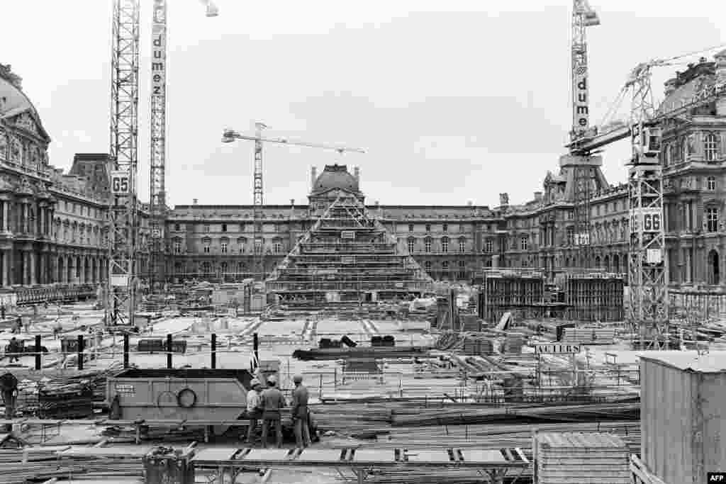 FRANCE - (FILES) In this file photo taken on August 7, 1987 the Louvre Pyramid, designed by Chinese-American architect I.M. Pei, is under construction, in the main courtyard (Cour Napoléon) of the Louvre Palace (Palais du Louvre) in Paris