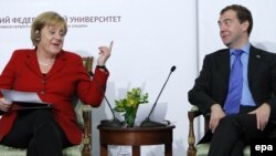 German Chancellor Angela Merkel (left) and Russian President Dmitry Medvedev