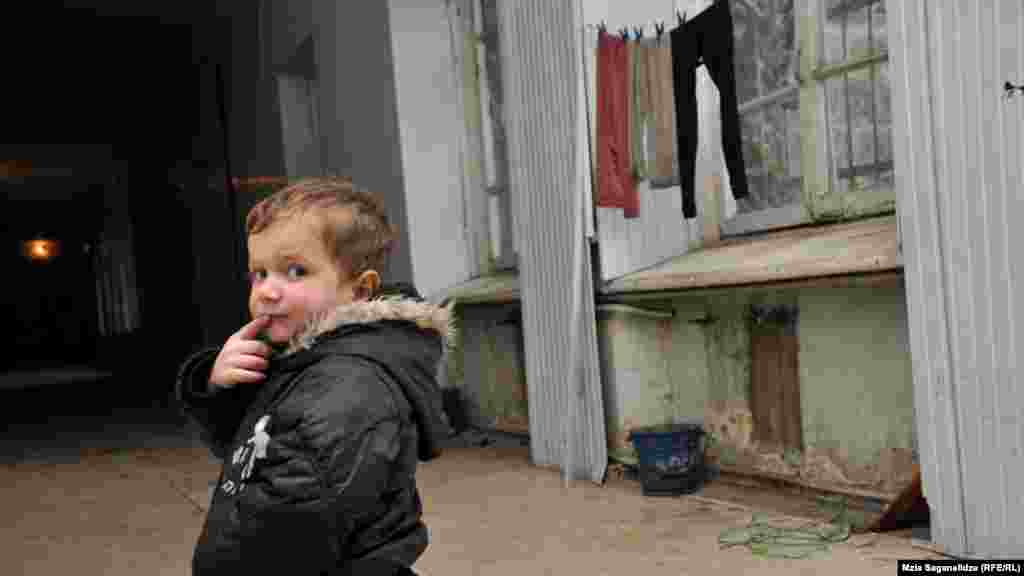 A child living in the former Railway Hospital in Tbilisi