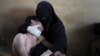 Samuel Aranda of Spain took the top award of the World Press Photo for 2011 with this picture of a woman holding a wounded relative during protests against Yemen&#39;s&nbsp;president.&nbsp;<br />
