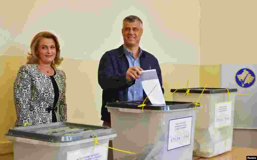Kosovo's prime minister, Hashim Thaci, and his wife vote in the capital, Pristina. 