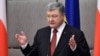 Poroshenko, Merkel Agree On Need For Quick Prisoner Exchange In Eastern Ukraine