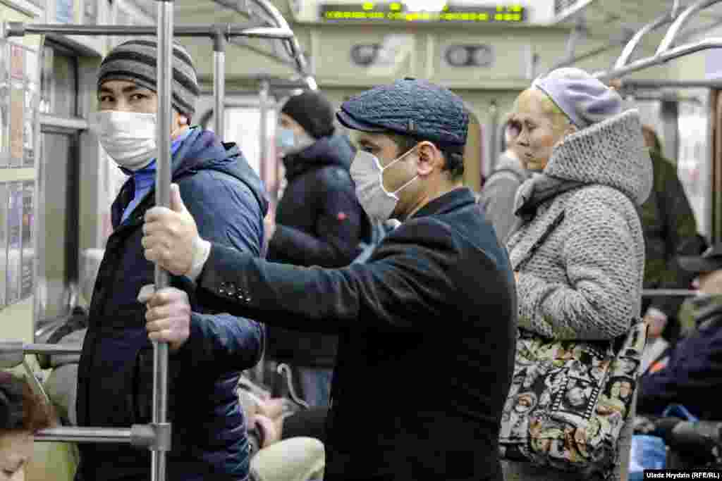 Some people wear face masks while traveling on public transport in Minsk. The WHO said the number of reported coronavirus cases in Belarus was &quot;growing rapidly,&quot; with 6,723 cases and 55 deaths reported by the authorities as of April 21. But some Belarusian doctors believe the actual numbers could be four to five times higher.