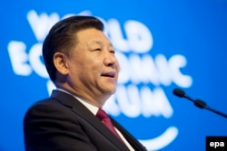 Си Цзиньпин выступает с речью в Давосе. 17 января 2017 года