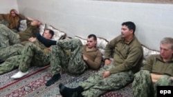 U.S. sailors are shownn in an undisclosed location in Iran in this handout picture released on the official website of Iranian Revolutionary Guards Corps on January 13.