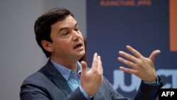 Britaniya əsilli Fransa iqtisadçısı Thomas Piketty.
