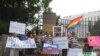 Some 20 people protested Russia's troubling record on gay rights in front of Moscow's embassy in Washington. 