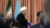 The former head of Iran's Judiciary (L) in the referral ceremony of his successor Ebrahim Raeisi, on March 11, 2019.