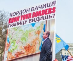 Плакат на акції протесту проти агресії Росії стосовно України. Вашингтон, 6 березня 2014 року