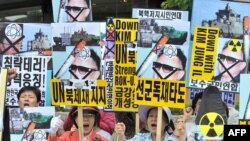 В Сеуле проходят демонстрации против возможных военных действий со стороны КНДР