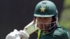 Pakistani Umar Akmal prepares to play a shot during a practice session before a match against New Zealand on March 7