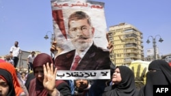 Прихильники «Мусульманського братства» і Мухаммада Мурсі протестують у Каїрі, 30 серпня 2013 року