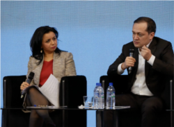 At a preelection forum on civil society, Communications Minister Komil Allamjonov (right) answers a question as Navbahor Imamova, a journalist for VOA's Uzbek Service and a moderator for the discussion, looks on in Tashkent on December 19.