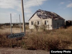 Обстріляний будинок у Щасті, Луганщина