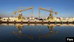 Краны в порту Бендер-э Имам Хомейни в иранской провинции Хузестан