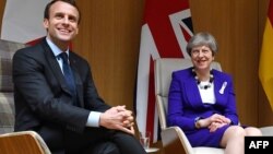 (Emmanuel Macron și Theresa May, imagine de arhivă.