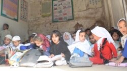 Students at a community school in Peshawar