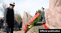 President Sooronbai Jeenbekov attended memorial events in Aksy on March 17.