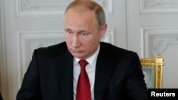 V.Putin