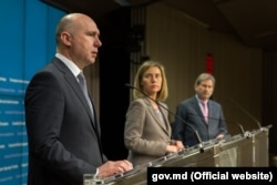 Pavel Filip și eurocomisarii Federica Mogherini și Johahnes Hahn