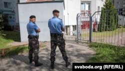 Belarusian police officers during a raid on the a news agency in Minsk on August 7.