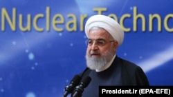 Iranian President Hassan Rohani delivers a speech during a "nuclear technology day" in Tehran on April 9.