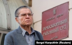 Former Russian Economy Minister Aleksei Ulyukayev leaves after a court hearing in Moscow on November 13.