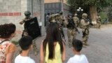 KYRGYZSTAN -- Kyrgyz special forces stand guard at former president of Kyrgyzstan Almazbek Atambaev residence in the village of Koi-Tash, August 7, 2019