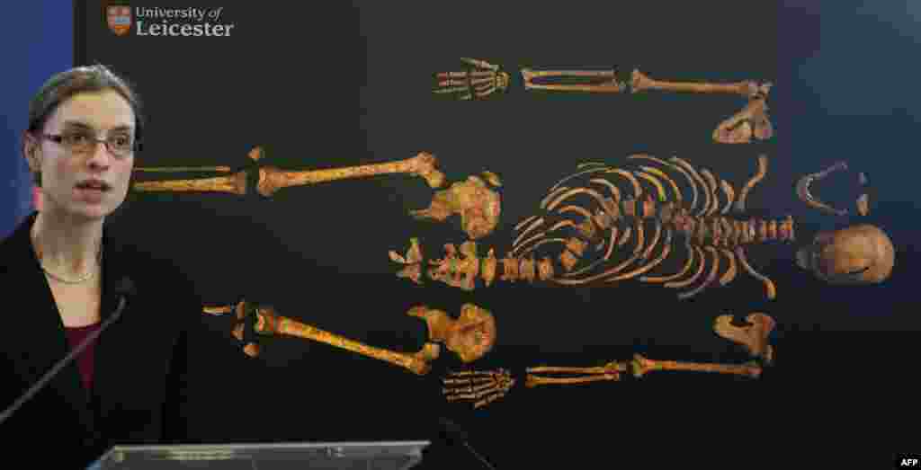 Dr. Jo Appleby, a lecturer in bioarchaeology at Leicester University, addresses a press conference about the researchers' findings. DNA taken from the excavated remains was found to match a 17th-generation descendant of the king's sister.