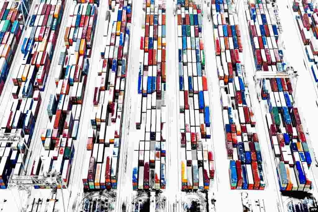 Snow-covered containers create a pattern at the port of Rotterdam in the Netherlands. (AFP/Robin Utrecht)