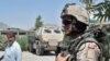 Канадский военнослужащий Международных сил по поддержанию безопасности несет патрульную службу в Кандагаре
