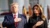 U.S. President Donald Trump and first lady Melania Trump observe a moment of silence to mark the 18th anniversary of September 11 attacks on the South Lawn of the White House in Washington, September 11, 2019