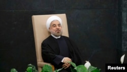حسن روحانی در انتظار آغاز سخنرانی خود در مجمع عمومی سازمان ملل
