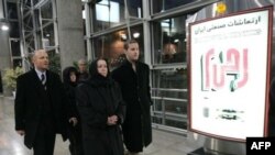 The wife of missing ex-FBI agent Robert Levinson, Christine (second right), traveled to Tehran in 2007 with her son Daniel (right) and sister Susan (second left) in a vain attempt to learn more about her husband's disappearance.