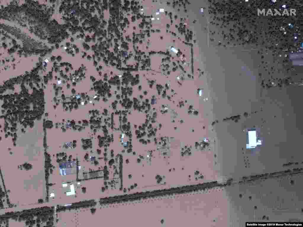 U.S. -- Satellite image shows Simonton, TX, during flooding after Hurricane Harvey on August 30, 2017