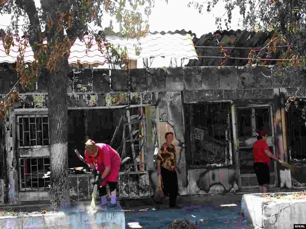 Burned-out stores in Osh city center