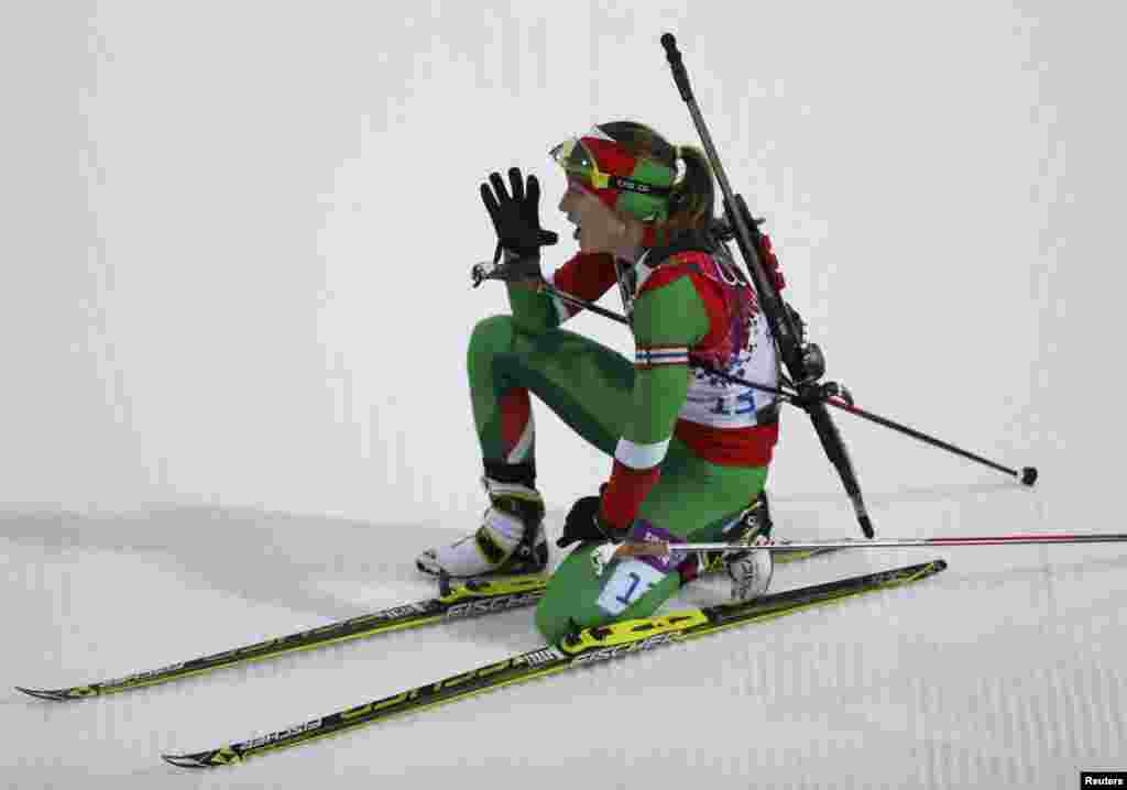 Gold medalist for Belarus Darya Domracheva reacts after crossing the finish line in the women's 15-kilometer biathlon individual event. (Reuters/Stefan Wermuth)