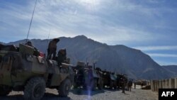 French soldiers prepare to depart for Kabul following a handover ceremony at the French military base in Nijrab district of Kapisa Province on November 20.