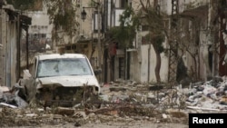 Хомс шаарынын аткылоодон талкаланган эски бөлүгү. 