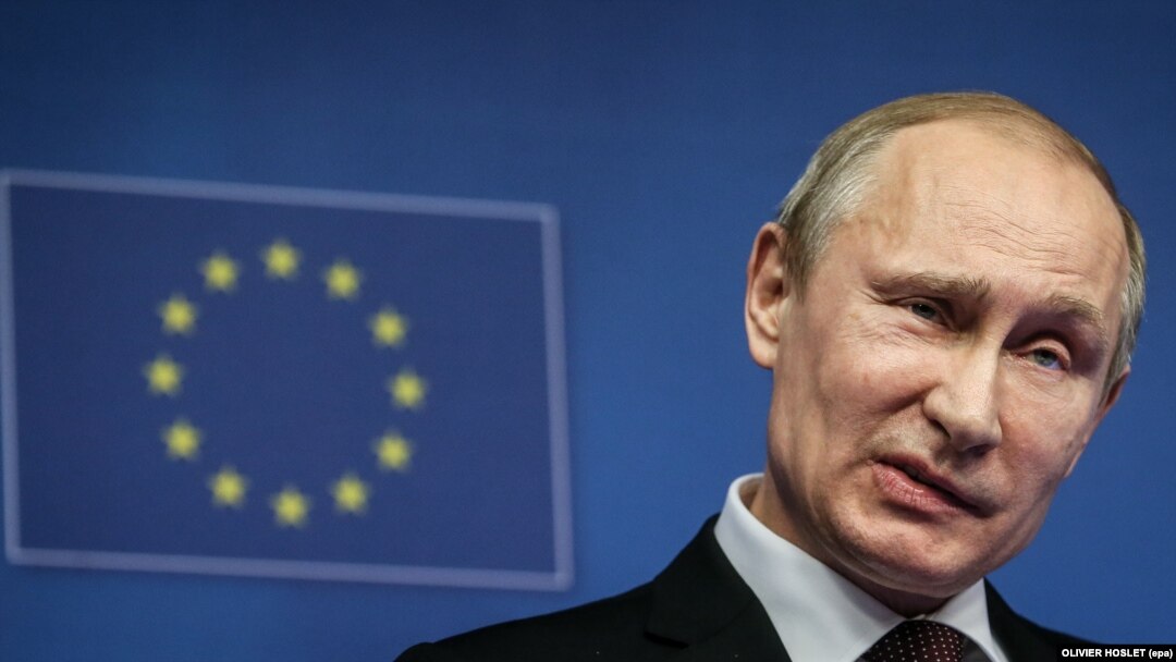 Владимир Путин на фоне символики ЕС (фото 2014 года)
