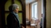 Crimea -- Miriem (L), a wife of Emir-Usein Kuku, a local humar rights activist who was arrested by Russian authorities, is by the kitchen door in their house in Koreiz, Crimea, March 13, 2016