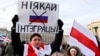 A protester holds a banner reading "No to integration!" during a rally in downtown Minsk on December 7.