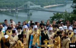 Metropolitan of Kyiv and All Ukraine Onufriy, the primate of the Ukrainian Orthodox Church -- Moscow Patriarchate, leads a prayer marking the Christianization of the country in Kyiv on July 27.