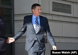 Donald Trump's former national security adviser Michael Flynn leaves a federal court in Washington on December 1.