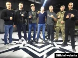 American Robert Rundo (center) with Ukrainian Azov Battalion members at the Reconquista Club in Kyiv on April 27.