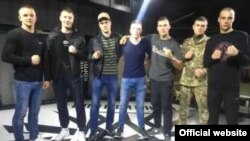 American Robert Rundo (C), leader of the California-based violent alt-right group known as the Rise Above Movement (RAM), with Ukrainian Azov members at Reconquista Club in Kyiv on 27 April 2018 as shown on Reconquista's Facebook page.