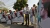 Pakistani civil society activists hold portraits of Mashal Khan who was killed by a mob of his fellows students for alleged blasphemy in Lahore in April 2017. (file photo)