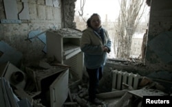 Донецк, последствия попадания снаряда в жилой дом, 1 февраля